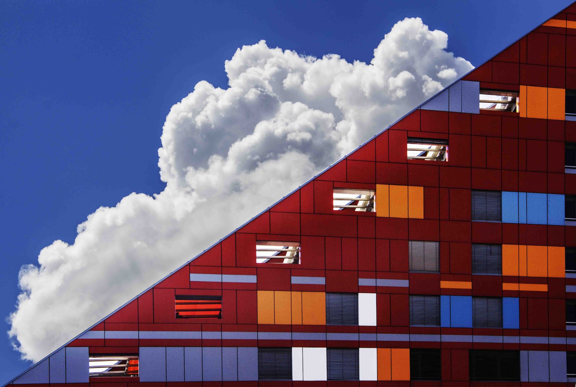 Building with clouds.